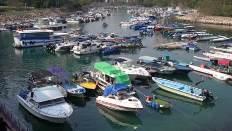 13-February-2023---Small-Fishing-And-Leisure-Boats-Docked-In-Tiu-Keng-Leng-Pier-In-Hong-Kong