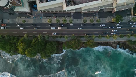 Aerial-top-down-shot-of-busy-traffic-on-GEORGE-WAINGINGTON-AVENUE-in-Santo-Domingo