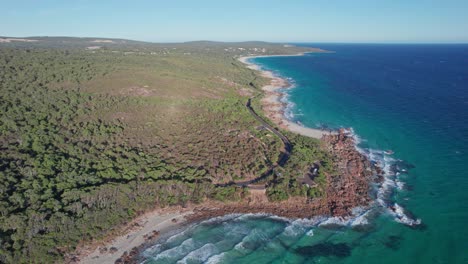 Aerial-view-of-the-rugged-but-beautiful-coastline-of-dunsborough-and-eagle-bay-on-a-gusty-morning-crating-some-waves