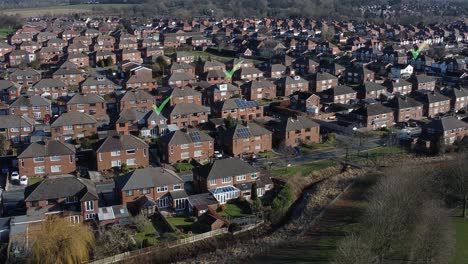Multiple-tick-icons-flashing-above-aerial-view-residential-British-neighbourhood-property-concept