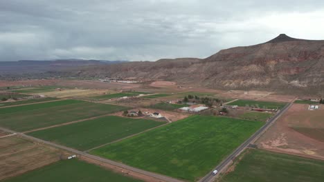 Mollie's-Nipple-Butte-Above-Village-in-Countryside-of-Utah-USA,-Drone-Aerial-View