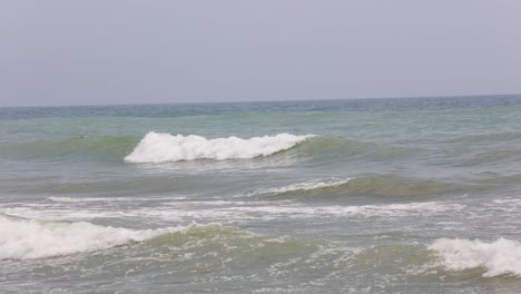 Sea-Waves-Rolling-Towards-Beach-In-Vama-Veche,-Romania---wide