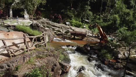 Wooden-Bridges-Over-Fast-Flowing-River-In-Datanla-Falls-In-Dalat,-Vietnam