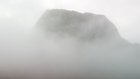 4K-Rising-above-the-fog-and-Clouds-Meteora-Greece,-Pillar-Rock-Formations,-Ancient-Greece,-Wonders-of-the-World,-Tourist-Destination,-Natures-Beauty,-Breathtaking-imagery,-Stone-Age,-Hide-Out,-Magic