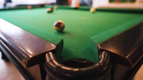 Missing-the-shot-on-snooker-billiard-table-pocket-on-focus