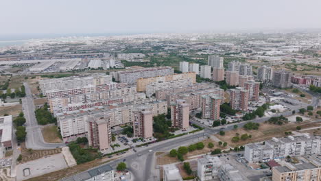 Aerial-footage-rotating-around-apartment-buildings-in-the-suburbs-outside-of-Bari,-Italy