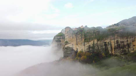 4K-Monestary-of-Varlaam-Meteora-Greece,-Magical-Ancient-Building-Floating-in-the-FOG,-Fall-colors,-Ancient-Greece,-Wonder-of-the-World,-Tourist-Destination,-Natures-Beauty,-Breathtaking-Timelapse