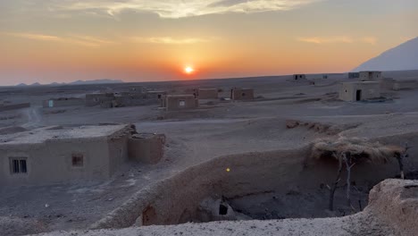 Balcony-rooftop-of-an-old-house-in-Iran-watching-the-sunset-twilight-maybe-the-sunrise-shine-sun-made-orange-color-landscape-became-wide-beautiful-outdoor-attraction-when-y-travel-trip-to-Iran-Desert