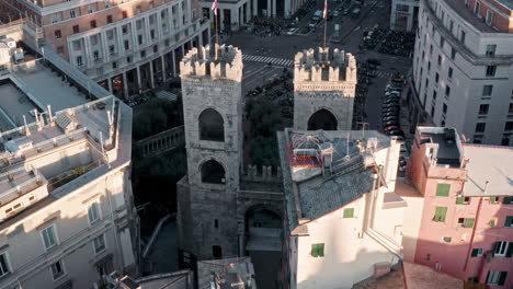 Drone-view-of-Porta-Soprana,-ancient-Towers-of-Sant'Andrea-in-Genoa,-Italy