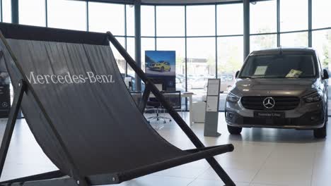 Spinning-on-a-giant-Mercedes-deckchair-in-a-Mercedes-dealership
