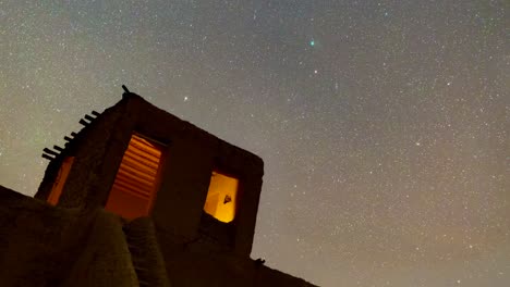 Desert-rural-clay-house-architectural-design-by-mud-brick-adobe-at-night-Starry-sky-Polaris-star-over-the-crystal-clear-weather-in-a-night-sky-photography-videography-of-local-nomad-native-people-Iran