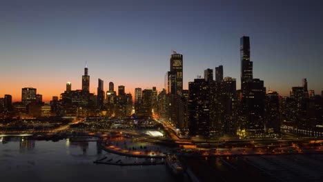 Drone-shot-around-the-New-Eastside-and-Loop-skyscrapers,-dawn-in-Chicago,-USA