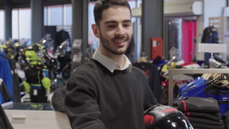 A-customer-arrives-at-the-checkout-with-his-motorcycle-equipment
