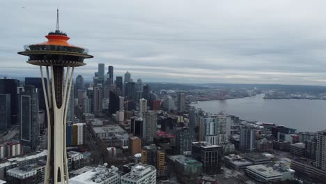 Seattle-WA-USA-Cityscape-Skyline,-Aerial-View-of-Downtown-and-Bay-on-Cloudy-Day