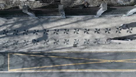 Aerial-view-of-Portuguese-stone-pattern-in-middle-of-Lisbon,-Portugal