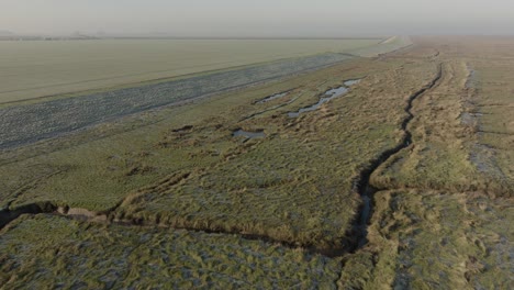 Dike-Sea-Defence-Salt-Marsh-The-Wash-Norfolk-UK-Aerial-Landscape-Frosty-Misty-Morning-Winter-Coastline