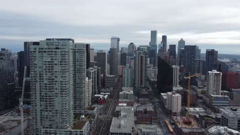 Aerial-Of-Downtown-Seattle-Cityscape,-Streets,-And-Skyline