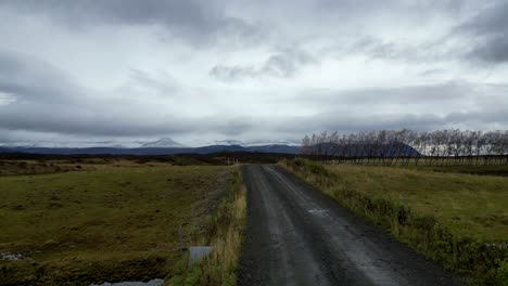 Lonely-Road-in-Beautiful,-Iceland-Remote-Landscape---Aerial-Drone-Flight-with-Copy-Space