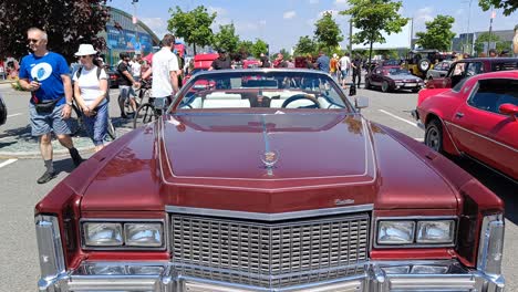 Vertical-panning-revealing-red-Cadillac-Eldorado-Convertible-US-car-from-1976