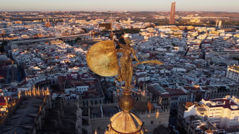 Giraldillo-sculpture--atop-the-Giralda,-Seville;-close-up-aerial