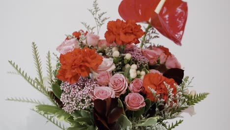 Descending-to-reveal-a-Valentine's-Bouquet-in-a-glass-vase