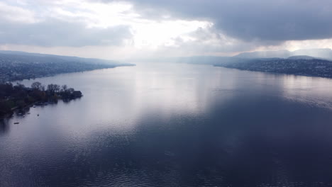 Calm-Waters-Of-Lake-Zurich-On-Overcast-Day-In-Switzerland