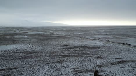 Highway-Road-in-Vast-Iceland-Landscape-in-Early-Winter,-Aerial-Flight