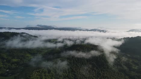 Aerial-Drone-Flight-Towards-White-Fog-Over-Green-Mountain,-Costa-Rica,-4K-60fps