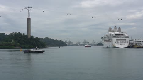 Landscape-views-of-cable-cars,-ferries-and-Resort-World-Cruises-docked-at-the-Singapore-Cruise-Centre-near-Sentosa-Island