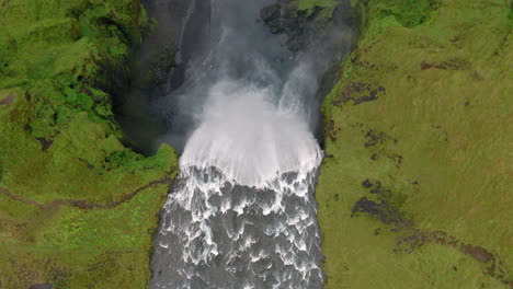 Aerial:-Top-down-view-of-the-famous-Skogafoss-waterfall-in-Iceland