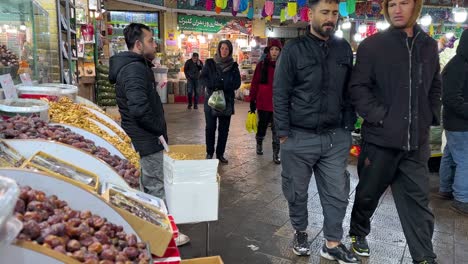 Grocery-store-spice-market-grand-Tajrish-Bazaar-in-Tehran-Iran-concept-of-shopping-buying-selling-nuts-nutcase-foods-saffron-pistachios-travel-trip-to-middle-east-taste-healthy-food-herbal-tea-walking