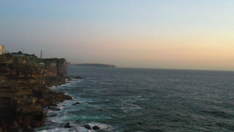 Drone-shot-of-the-large-cliffs-in-the-Eastern-suburbs-of-Sydney
