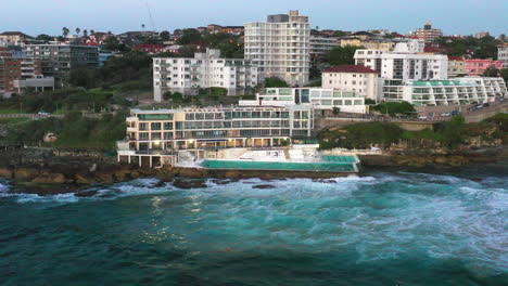 Bondi-Icebergs-drone-shot-with-early-morning-swimmers-doing-laps
