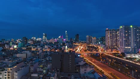 Saigon---Day-to-Night-Time-Lapse---High-Wide-Shot,-North-East-View---Vietnam,-Ho-Chi-Minh-City