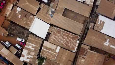 Cenital-aerial-view-above-suburban-rooftops-in-Yaounde-city,-Cameroon,-Africa
