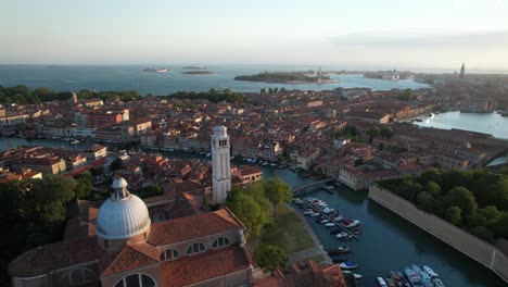 Aerial-Drone-Fly-Above-Grand-Canal-of-Venice-Italy,-City-Architecture,-Basilica,-Gondolas-and-Boats-in-Romantic-Summer-at-European-Travel-Destination