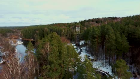 Aerial-View-of-Anyksciai-Laju-Takas,-Treetop-Walking-Path-Complex-With-a-Walkway,-an-Information-Center-and-Observation-Tower,-Located-in-Anyksciai,-Lithuania-near-Sventoji-River