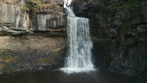 Waterfall-slow-motion-pull-away-from-close-up-at-Ingleton-Waterfalls-Trail-Yorkshire-UK