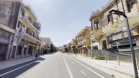 Moving-along-an-empty-street-in-Varosha,-Famagusta