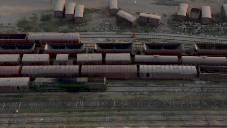 Aerial-top-down-photo-of-railway-transportation-hub-showing-the-different-trains-parked-next-to-each-other-on-the-rails