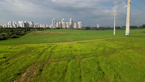 4k-Drone-Video--the-last-remains-of-Rechovot-old-historical-orange-fruit-orchards-and-vast-agricultural-open-fields-on-the-Eastern-outskirts-of-the-city-of-Rehovot--Israel