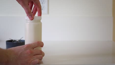 Making-homemade-plastic-free-almond-milk--male