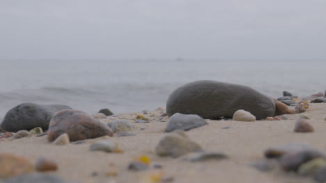 Rocks-On-The-Shore-Of-Baltic-Sea,-Gdynia,-Redlowo-District,-Poland