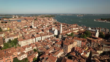 Warm-Aerial-Drone-View-Above-Venice-Italy,-Summertime-in-European-Travel-City,-Romantic-Destination-during-Daylight-in-Vibrant-Romantic-Atmosphere