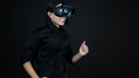 Young-Female-Wearing-VR-Goggles,-Waving-to-Camera-and-Starts-Running
