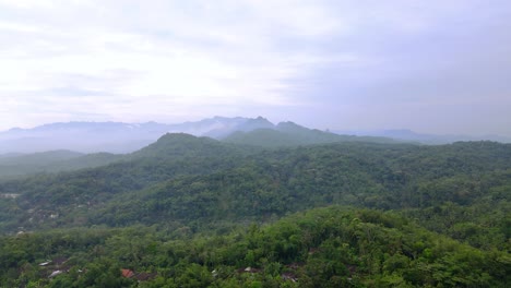 Aerial-view-of-nature-landscape-with-view-of-forests-and-hill-with-human-civilization---Tropical-Country