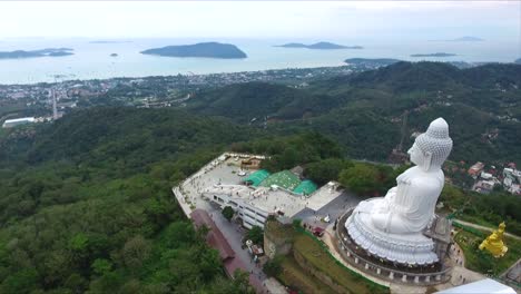 Pan-round-of-Tian-Tan-Buddha-in-Phuket,-with-a-spectacular-view-of-the-sea,-Thailand
