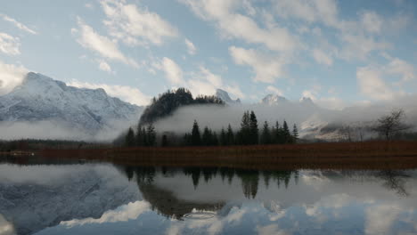 Beautiful-reflection-in-an-austrian-mountain-lake-in-winter