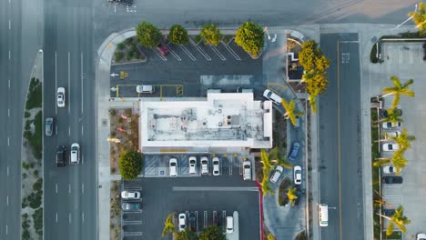 top-down-aerial-time-lapse-captures-customers-driving-to-McDonald's-and-waiting-in-the-drive-thru-line-to-order
