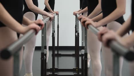 Girls-at-ballet-class-at-barré